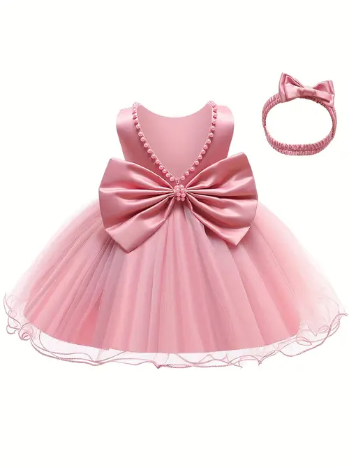 White Ball Gown for Baby Girls Featuring Ruffles, Lace, a Backless De…